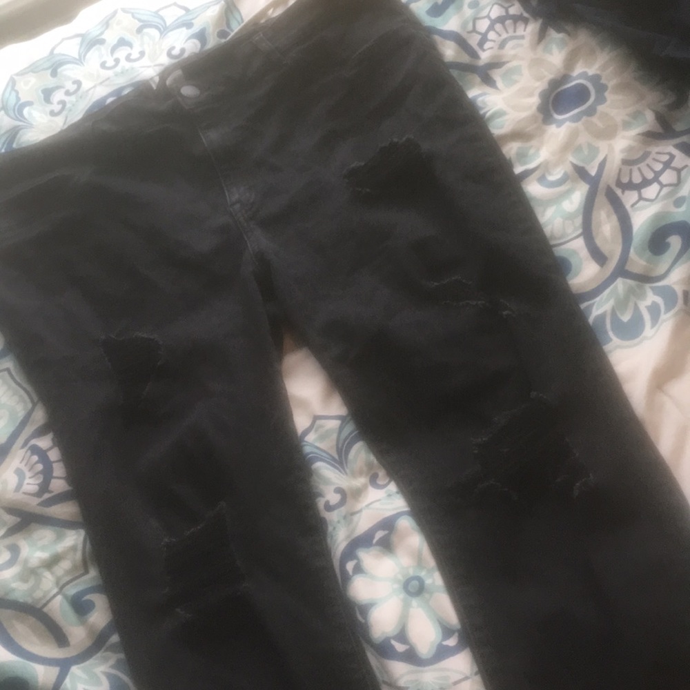 black ripped jeans
